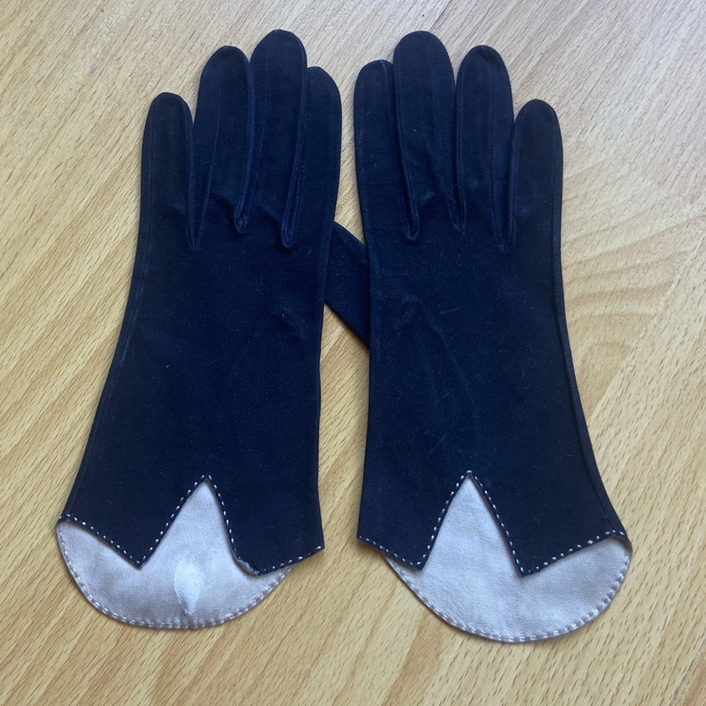 Very dark navy blue almost black suede gloves
